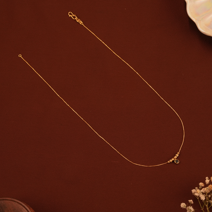 Sleek Black Pendant Gold Bead Chain