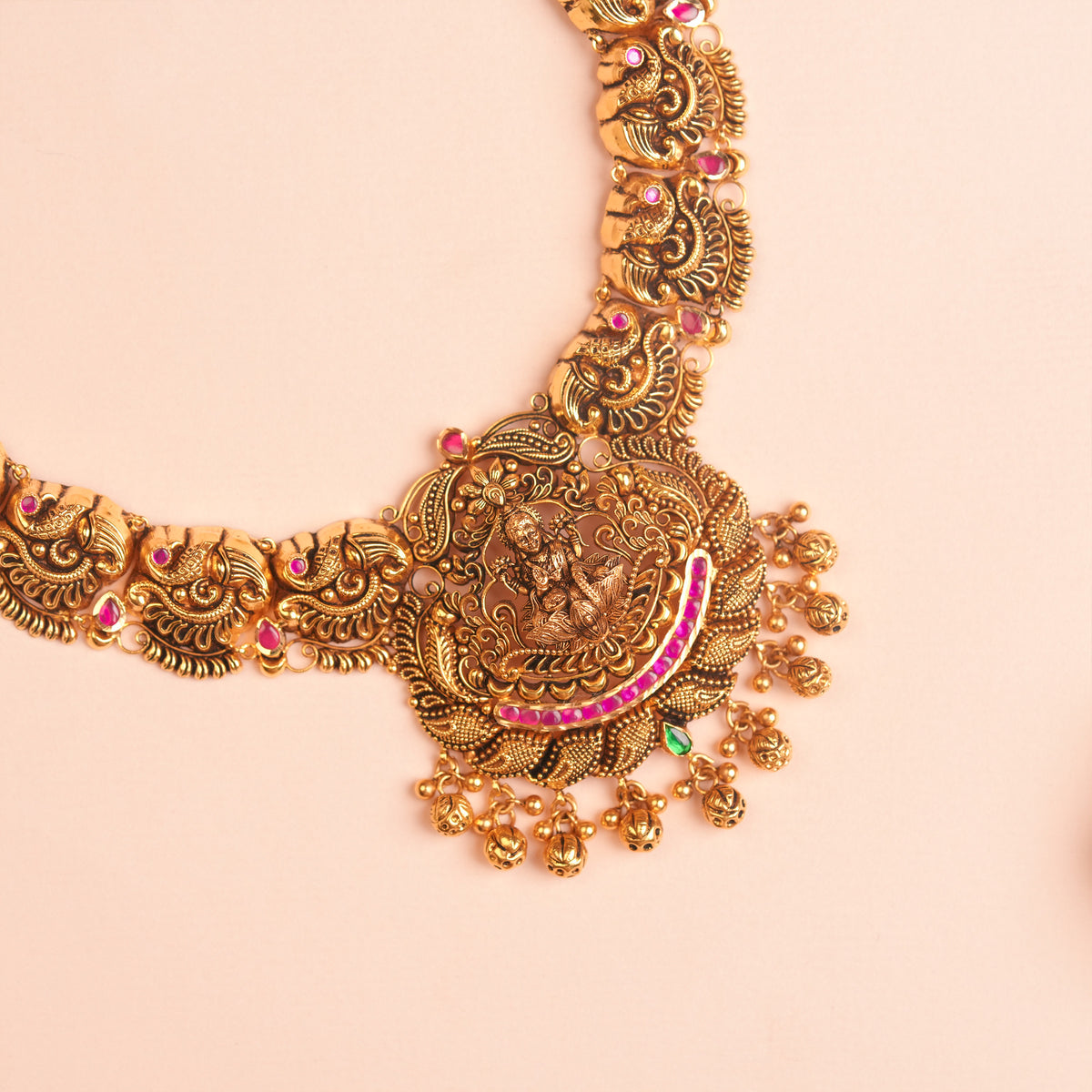 Gold Peacock Motif Temple Necklace with Floral Link Chain and Ruby Stones