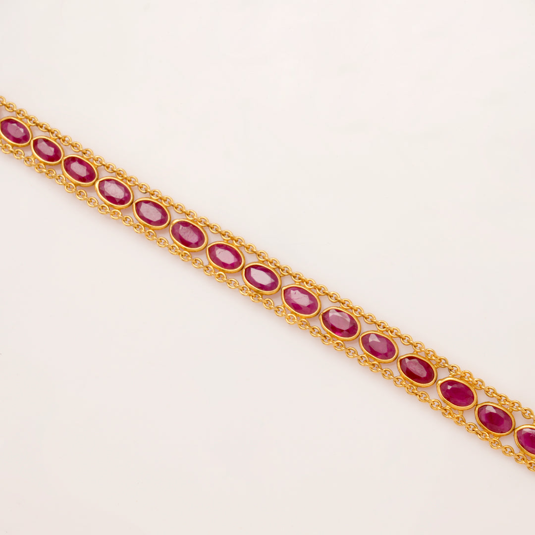 Elite Oval Shape Ruby Stone Gold Bracelet