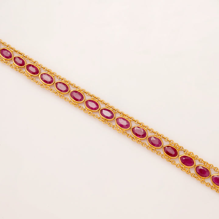 Elite Oval Shape Ruby Stone Gold Bracelet