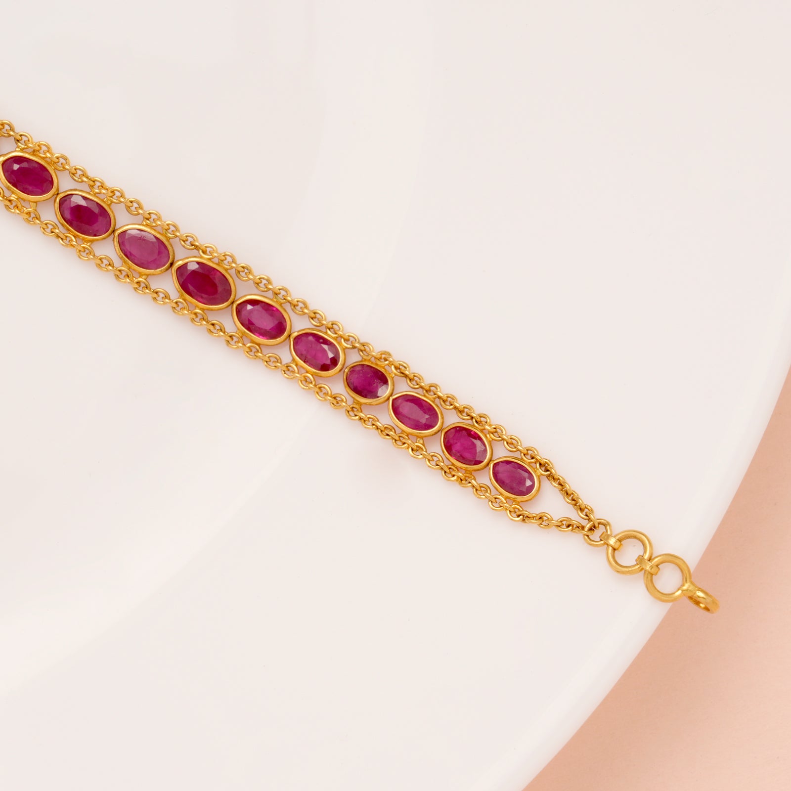 Elite Oval Shape Ruby Stone Gold Bracelet