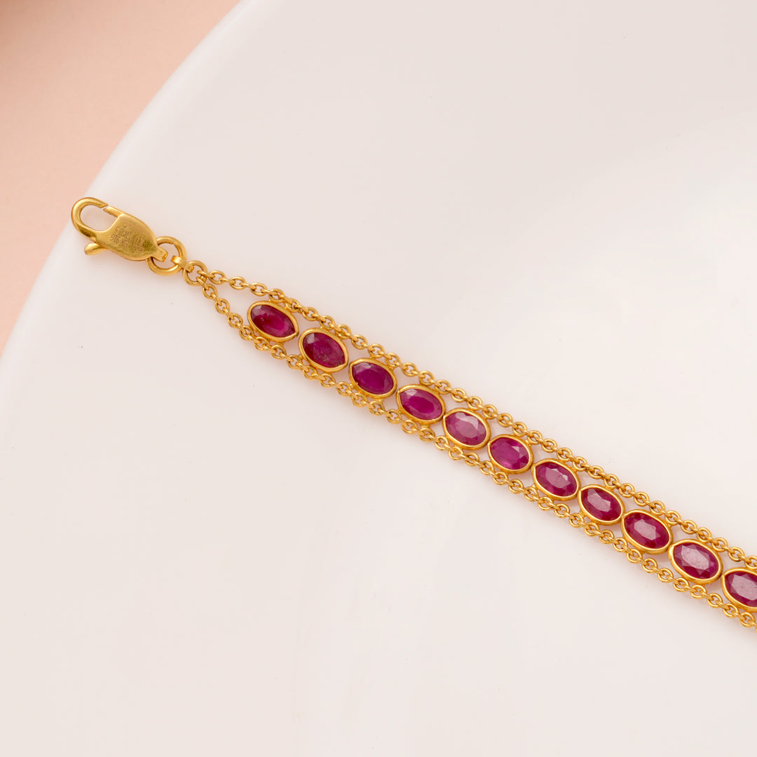 Elite Oval Shape Ruby Stone Gold Bracelet