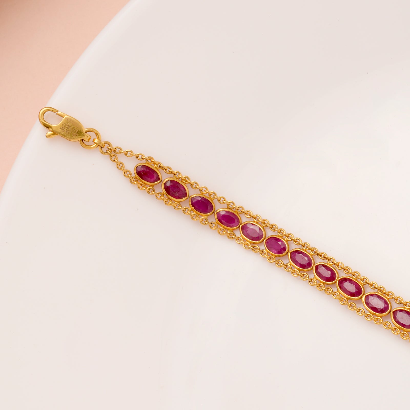 Elite Oval Shape Ruby Stone Gold Bracelet