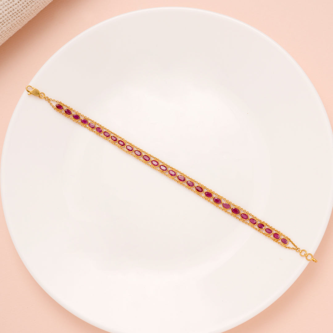 Elite Oval Shape Ruby Stone Gold Bracelet