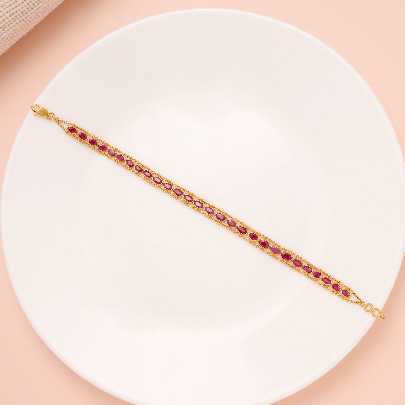 Elite Oval Shape Ruby Stone Gold Bracelet