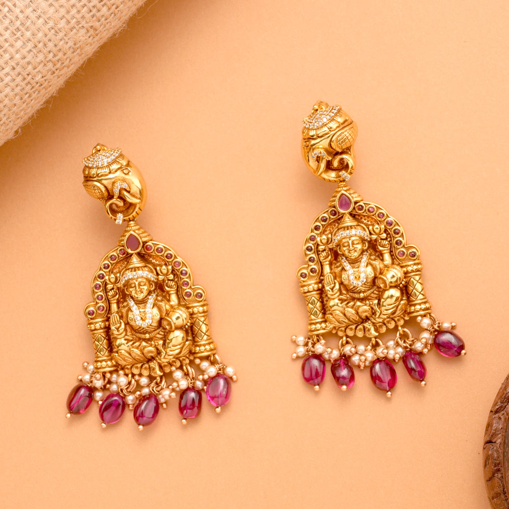 Ruby Beads with Gaja Lakshmi Golden Earrings