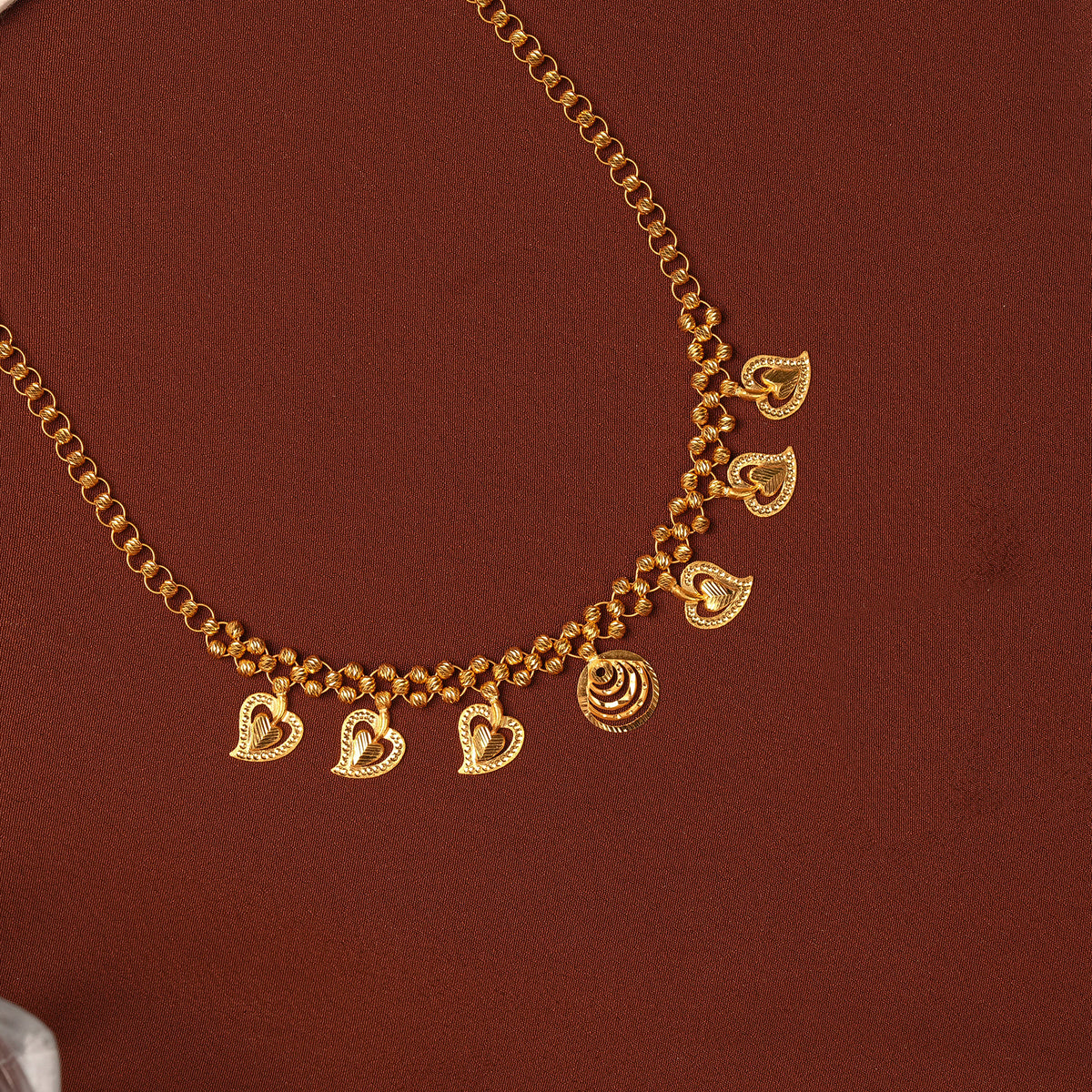 Gold Fancy Necklace with Hanging Leaf Charms