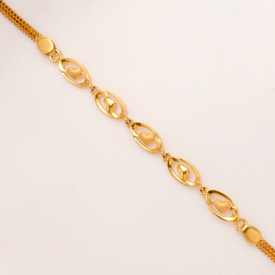 Regal Oval Shape with Mini Heart Gold Bracelet