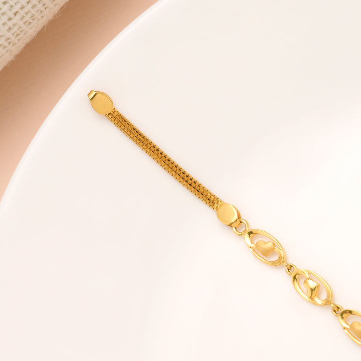 Regal Oval Shape with Mini Heart Gold Bracelet