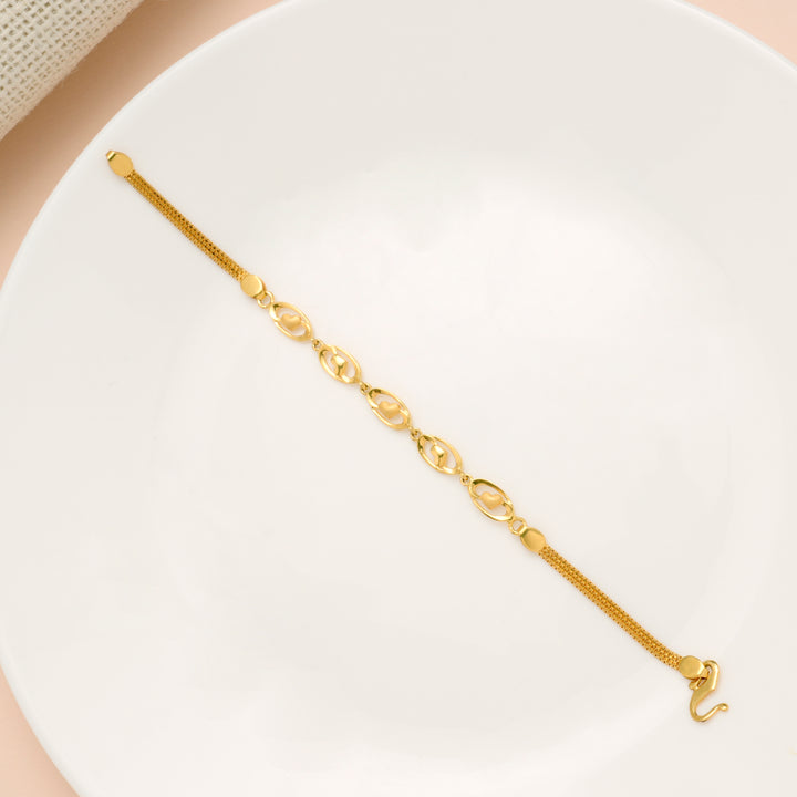 Regal Oval Shape with Mini Heart Gold Bracelet