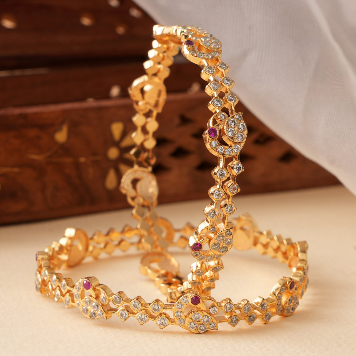Graceful Peacock Design with Ruby Bangle