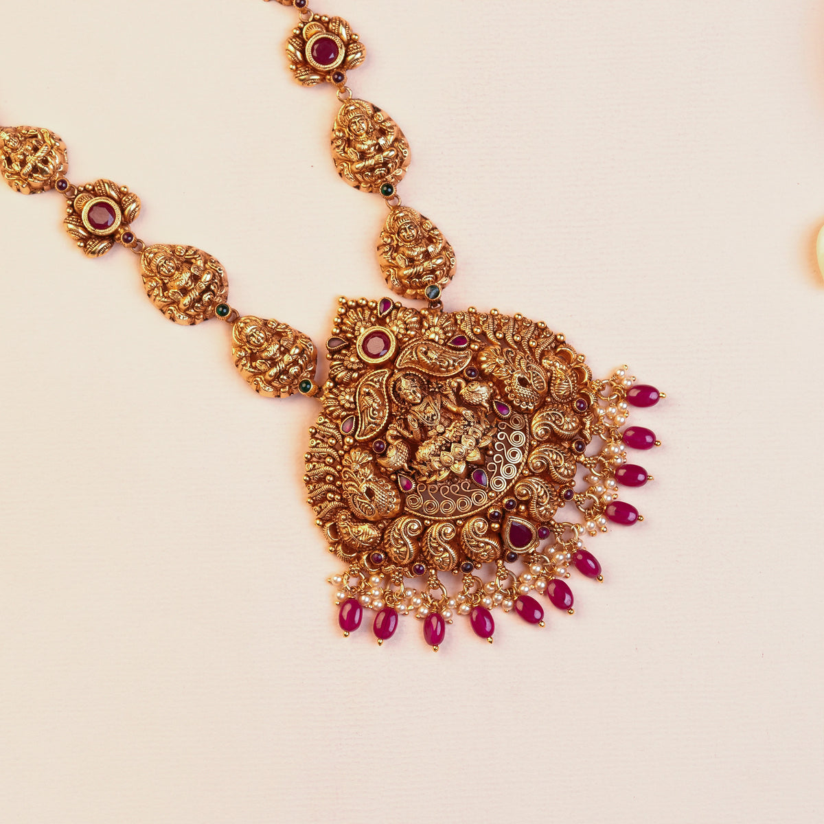 Silver Lakshmi Temple Haram with Peacock Pendant, Ruby-Red Stones and Pearl Drops