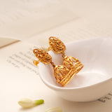 Goddess Nagas Lakshmi Bell Drop Golden Jhumkas