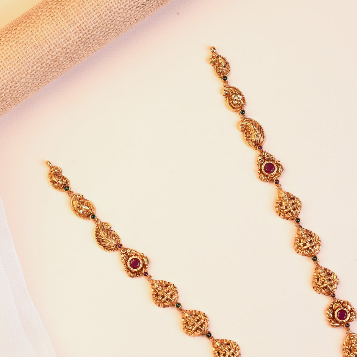 Silver Lakshmi Temple Haram with Peacock Pendant, Ruby-Red Stones and Pearl Drops