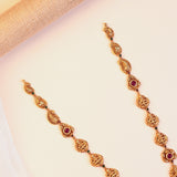 Silver Lakshmi Temple Haram with Peacock Pendant, Ruby-Red Stones and Pearl Drops