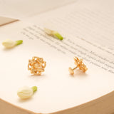 Sleek Spiral Flower Design Golden Stud