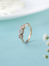 Twinkling Three Stone Diamond Rose Gold Ring