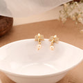 Elegant Pearl Drop Silver Golden Jhumkas