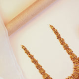 Silver Broad Peacock Temple Haram with Lakshmi Pendant and Gold Ball