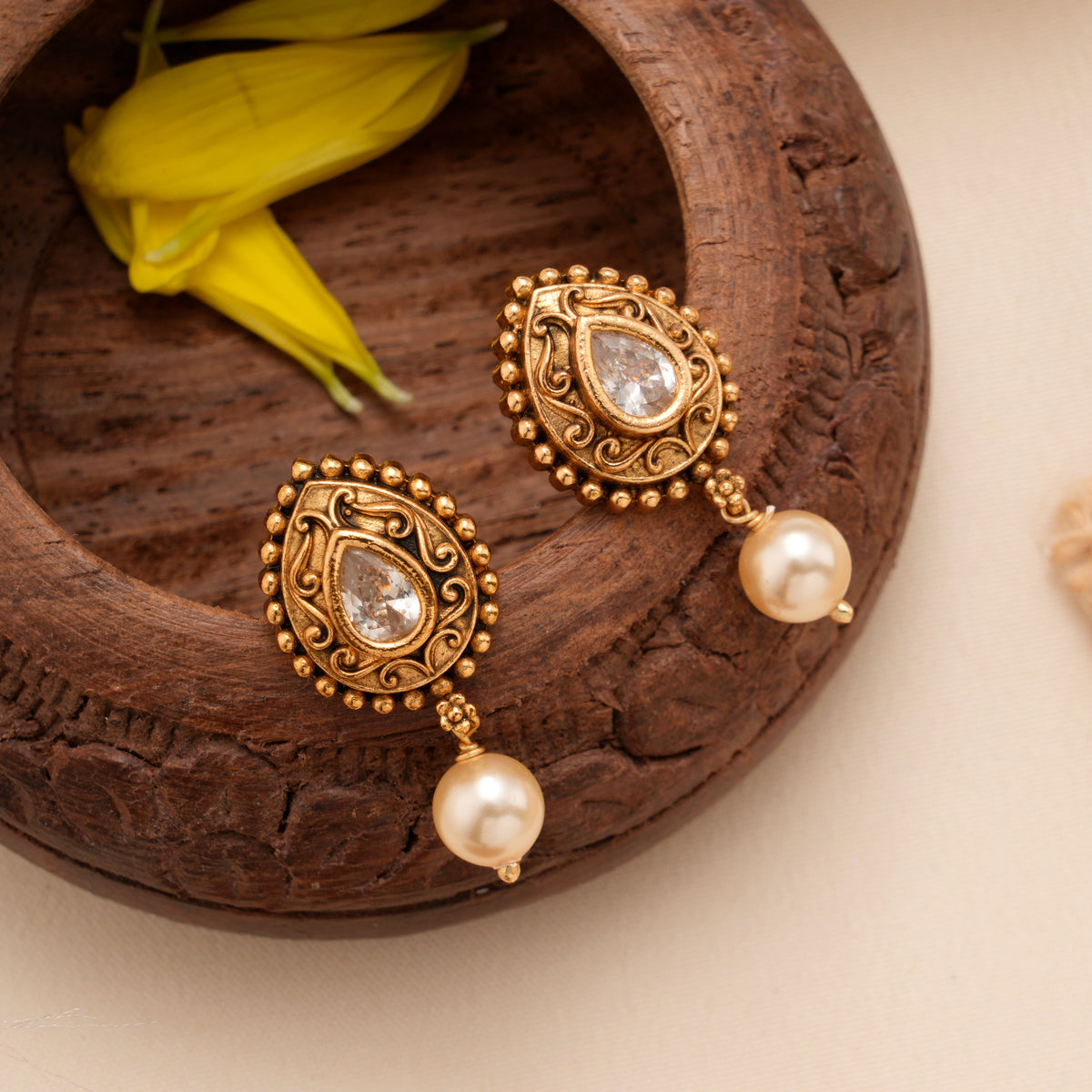 Regal Teardrop Stone with Pearl Golden Stud