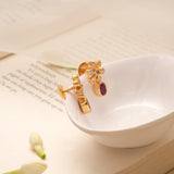Oval Ruby Drop Snowflake Design Golden Earring
