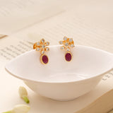 Oval Ruby Drop Snowflake Design Golden Earring