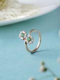 Emerald and Diamond Bypass Floral Ring