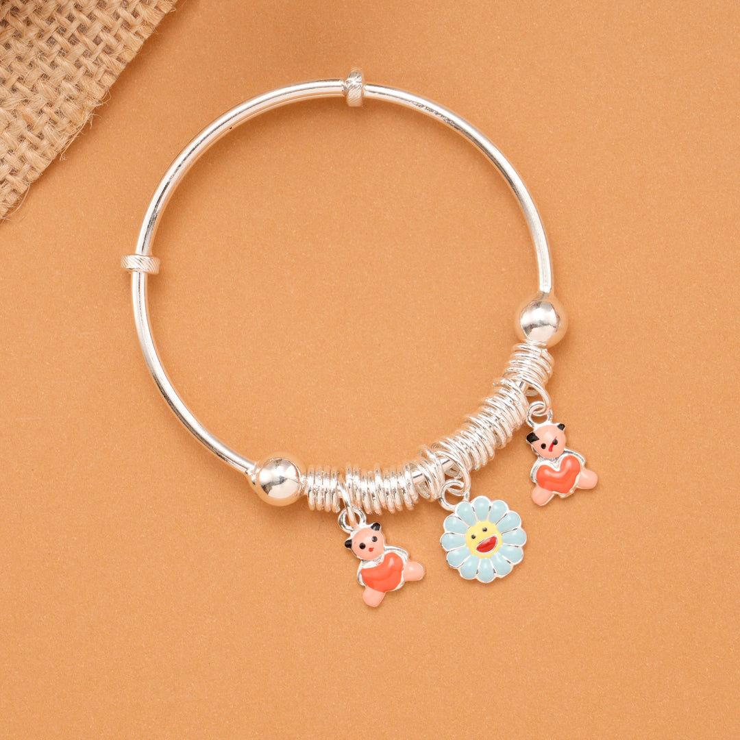 Cute Baby Doll & Blue Flower Charm Silver Bangle
