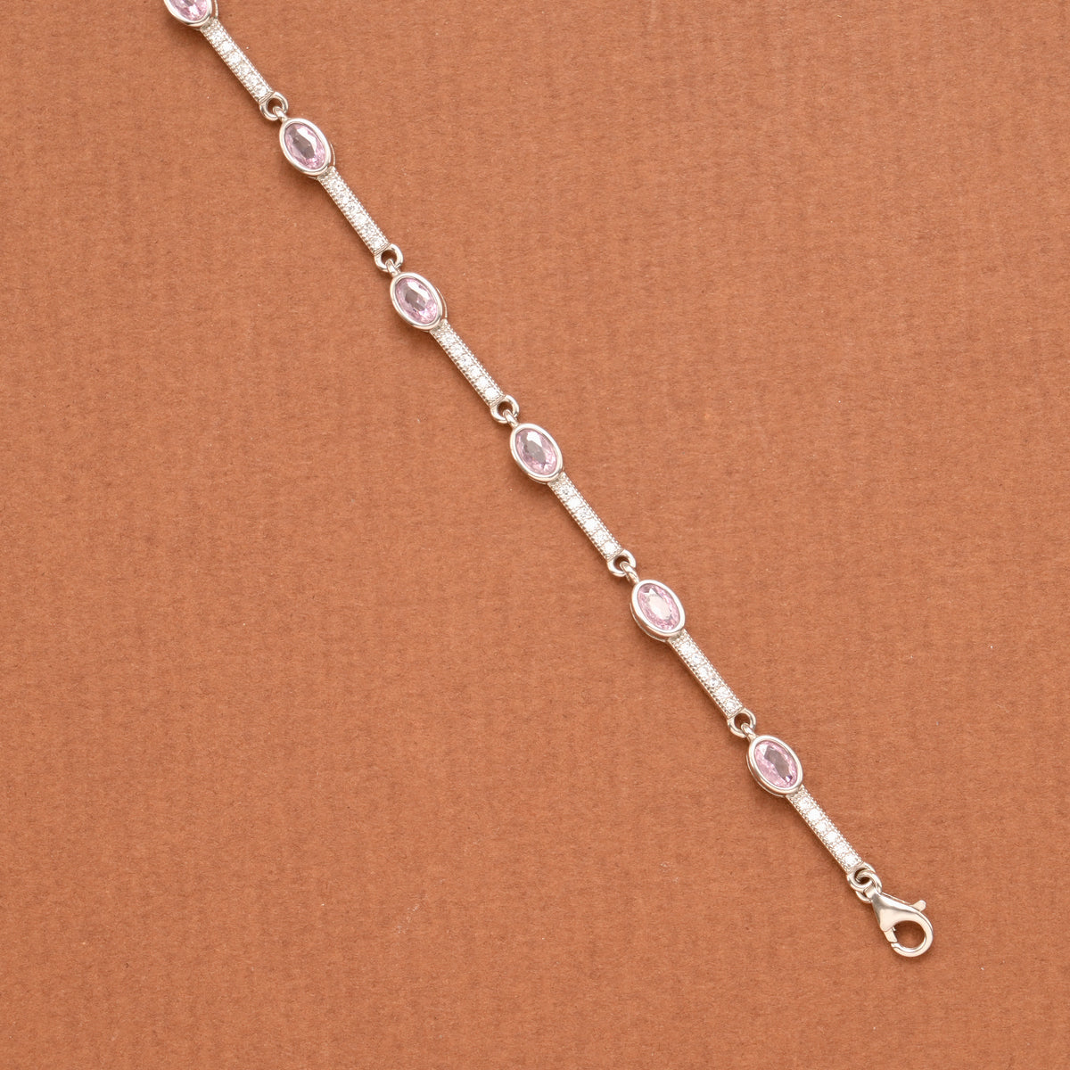 Trendy Baby Pink Oval Stone Silver Bracelet