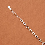 Floral and Gold Infinity Silver Bracelet