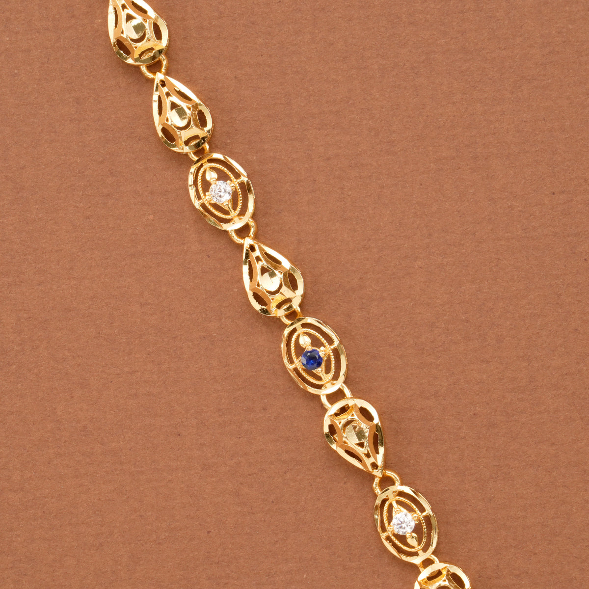 Oval Leaf Blue Stone Casting Golden Bracelet