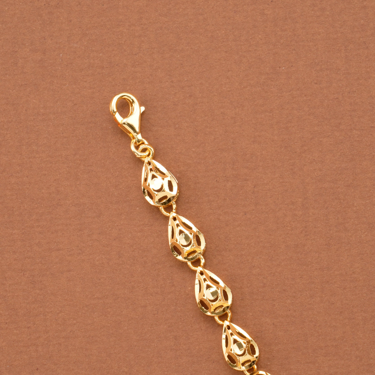 Oval Leaf Blue Stone Casting Golden Bracelet
