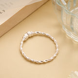 Sophisticated Twisted Silver Baby Bangle