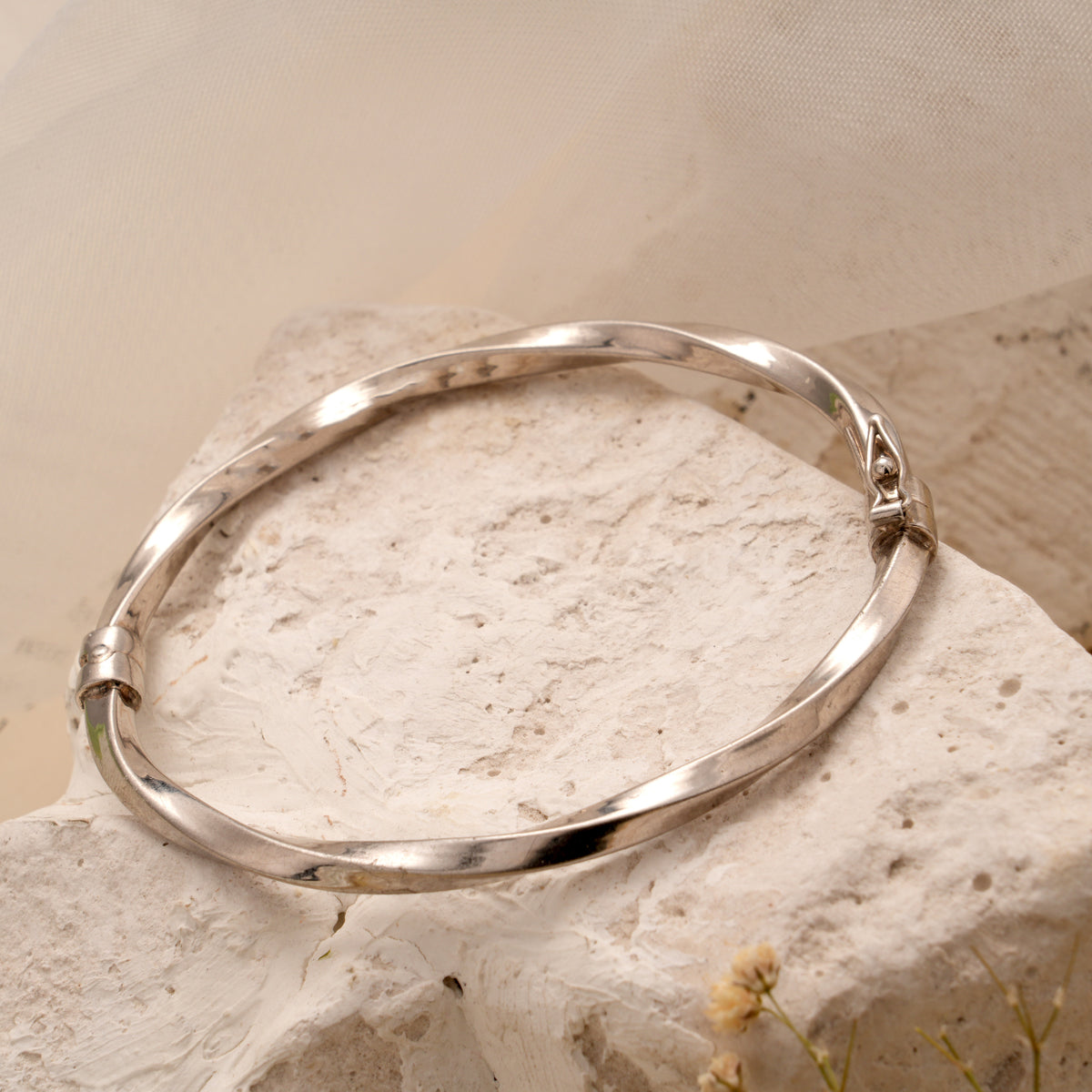 Modern Glossy Silver Twisted Bracelet