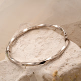 Modern Glossy Silver Twisted Bracelet