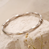 Modern Glossy Silver Twisted Bracelet
