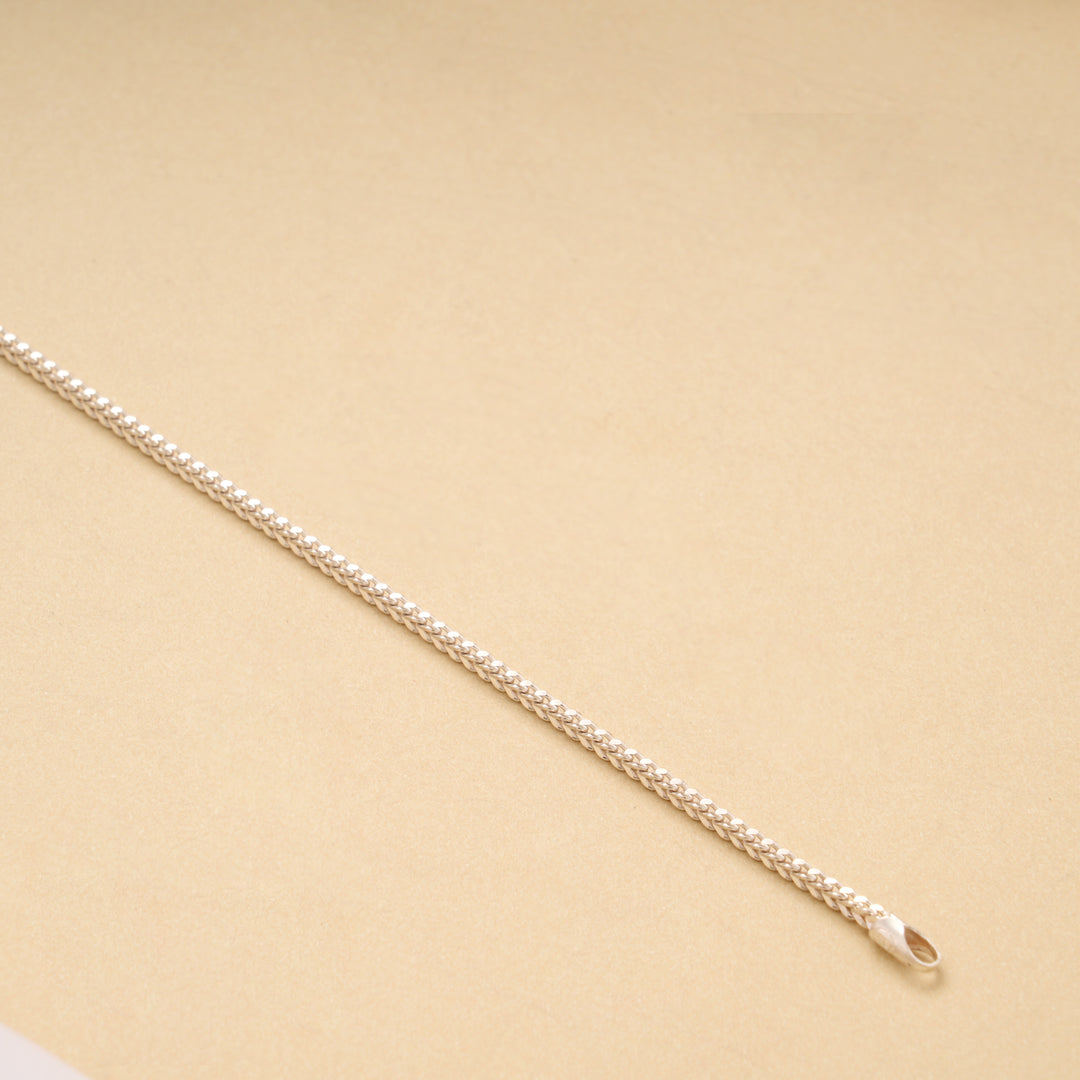 Sleek Silver Textured Woven Men’s Bracelet