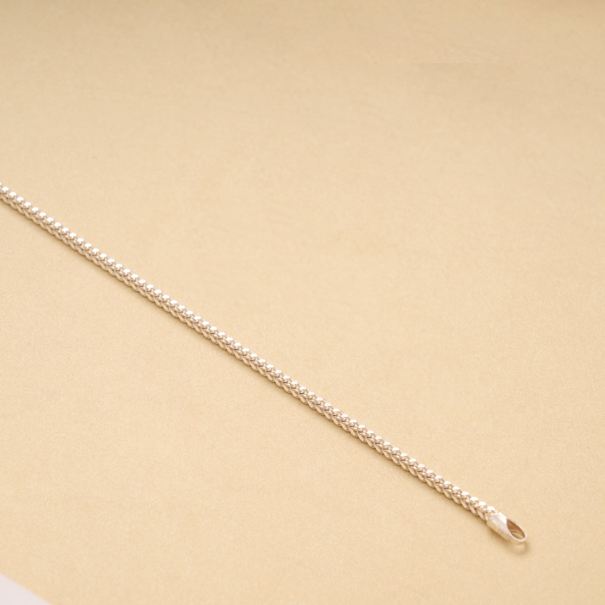 Sleek Silver Textured Woven Men’s Bracelet