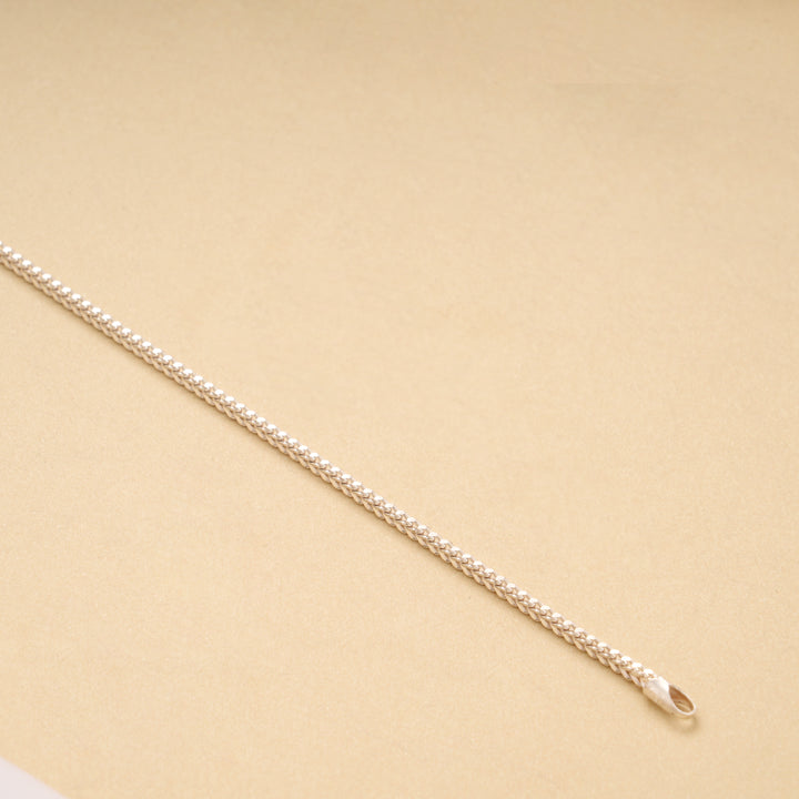 Sleek Silver Textured Woven Men’s Bracelet