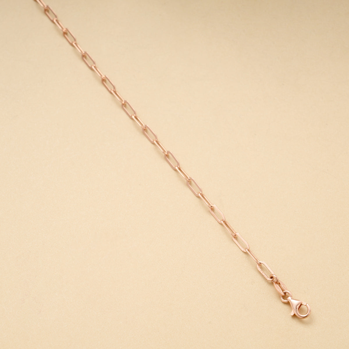 Fancy Silver Paper Link Rose Gold Bracelet