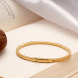 Fancy Interlink Golden Locked Bracelet