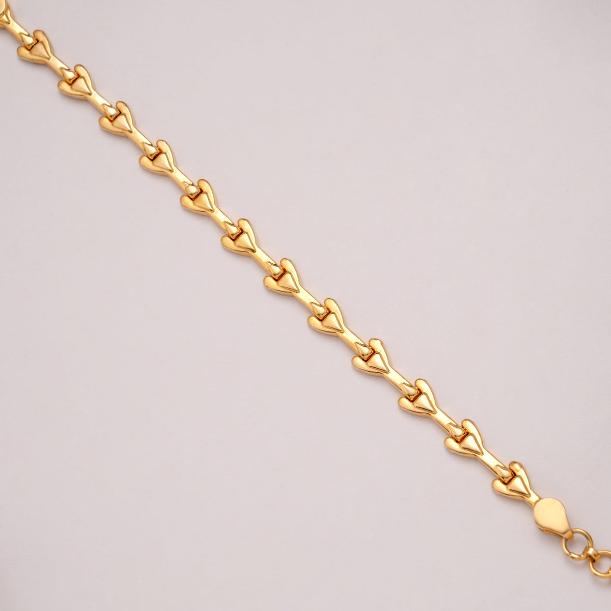 Heritage Heart Shaped Link Golden Bracelet