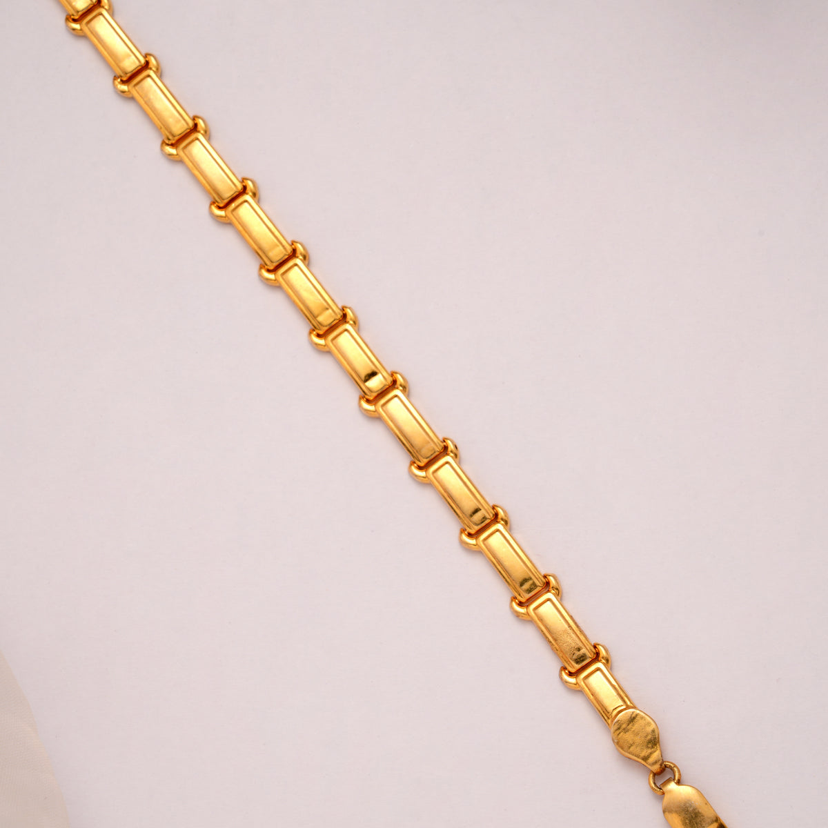Regal Golden Rectangular Bar Bracelet