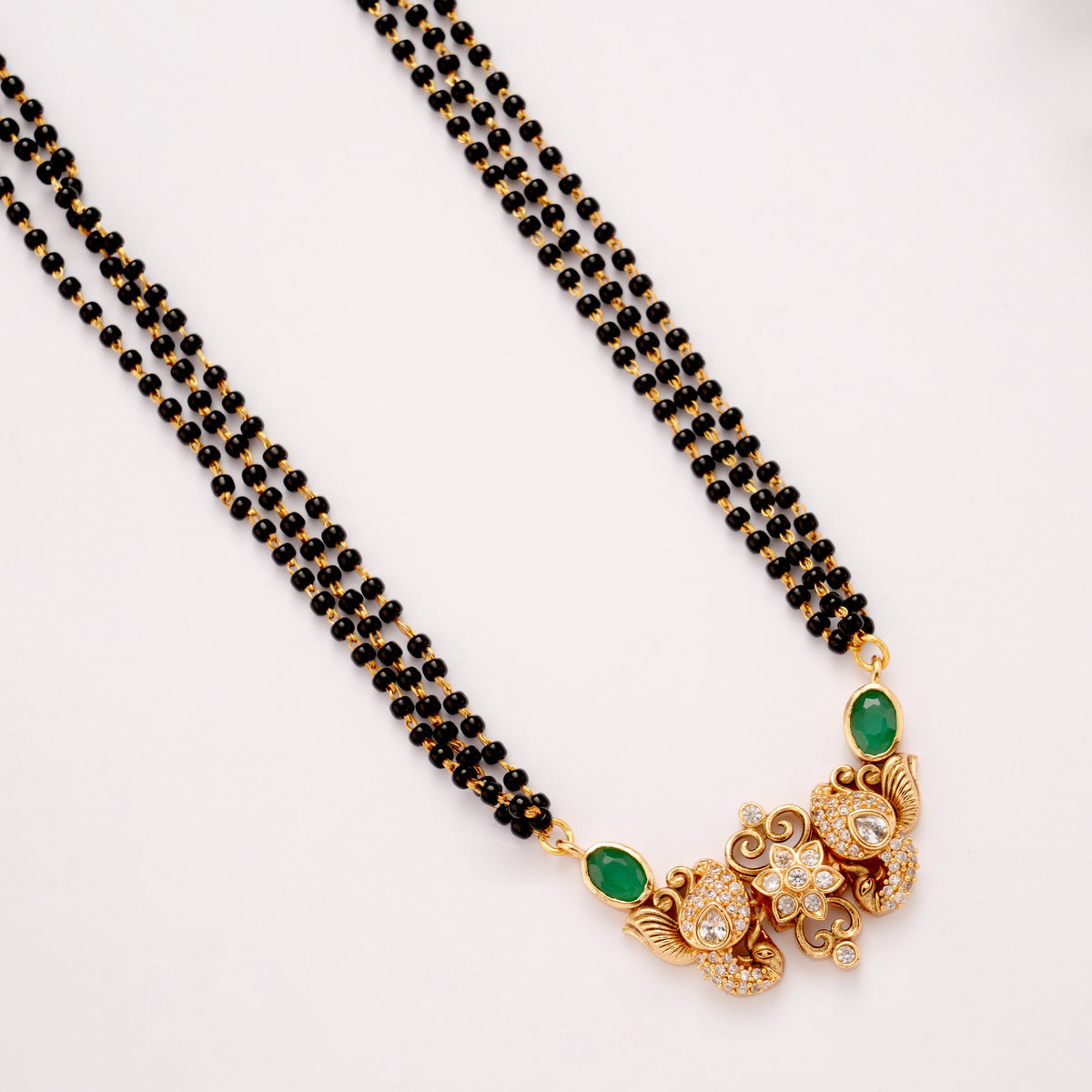 Floral Emerald Stone Mangal Sutra Golden Chain