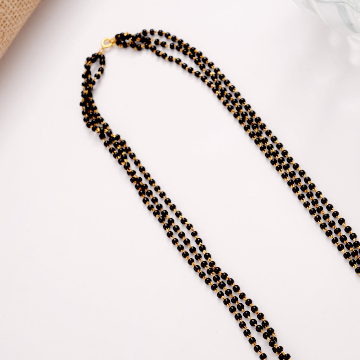 Floral Emerald Stone Mangal Sutra Golden Chain