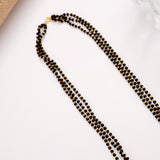 Floral Emerald Stone Mangal Sutra Golden Chain