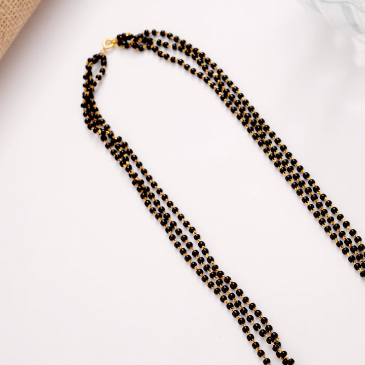 Floral Emerald Stone Mangal Sutra Golden Chain