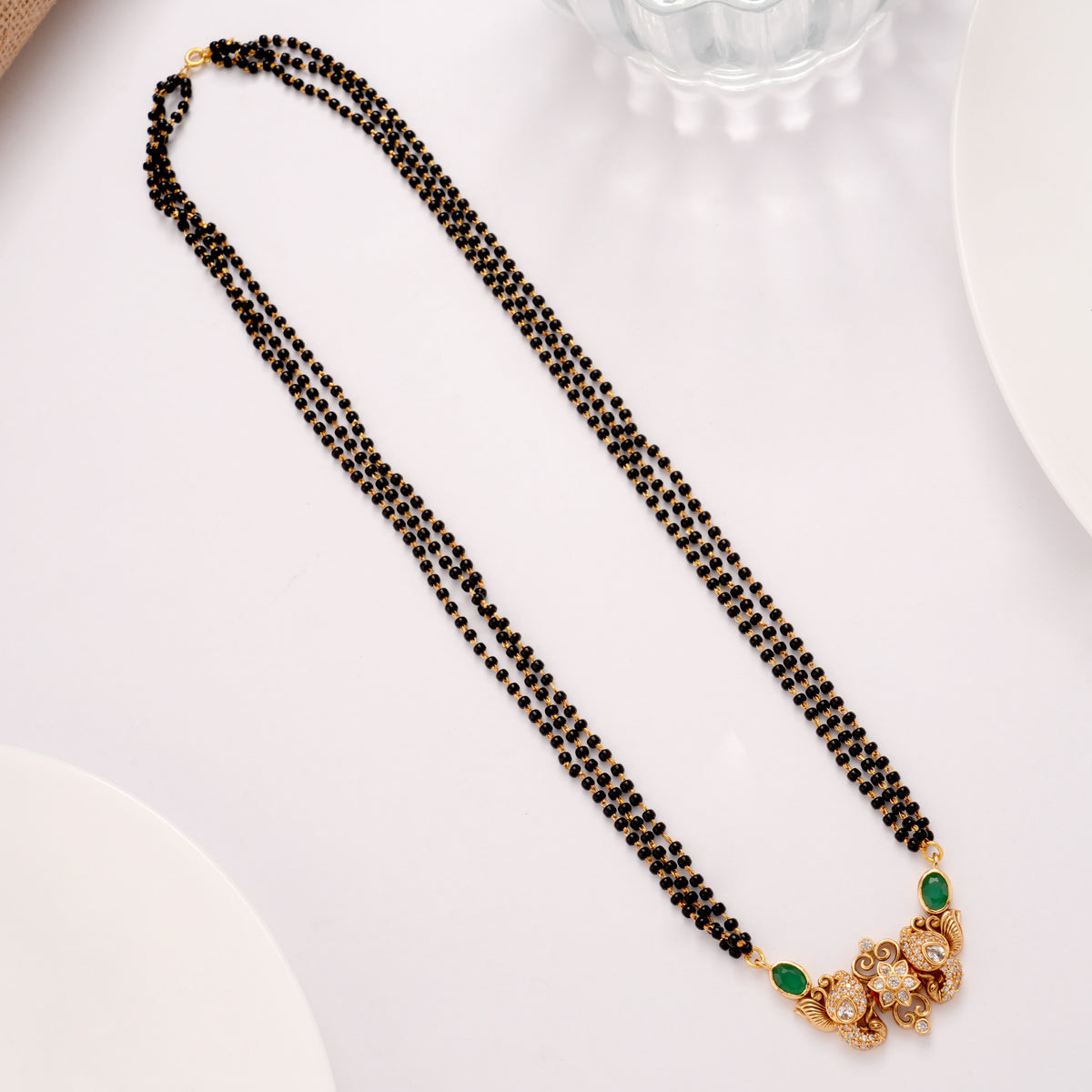 Floral Emerald Stone Mangal Sutra Golden Chain