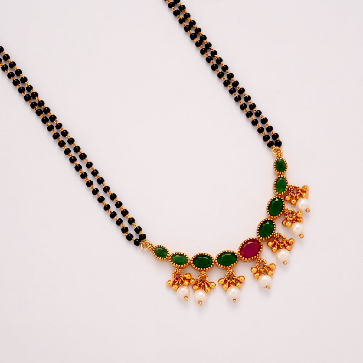 Emerald Stone with Pearl Drops Golden Mangal Sutra Chain