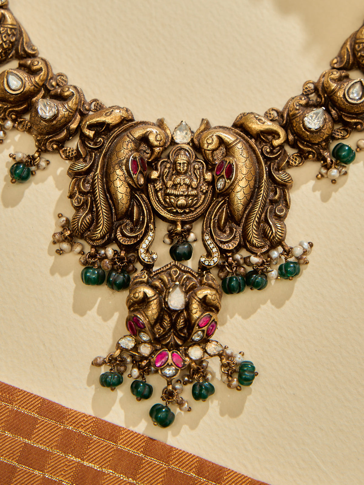 Elegant Emerald Beads and Ruby Lakshmi